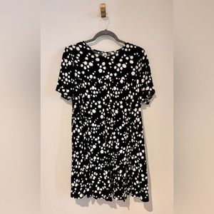 Black Baby Doll fit dress with daisy pattern